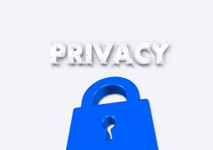 La parola PRIVACY in bianco con ombreggiatura e un lucchetto blu sottostante, simbolo della tutela dei dati personali e del GDPR